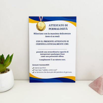 foto fronte del biglietto di auguri "attestato di permalosità avanzato"