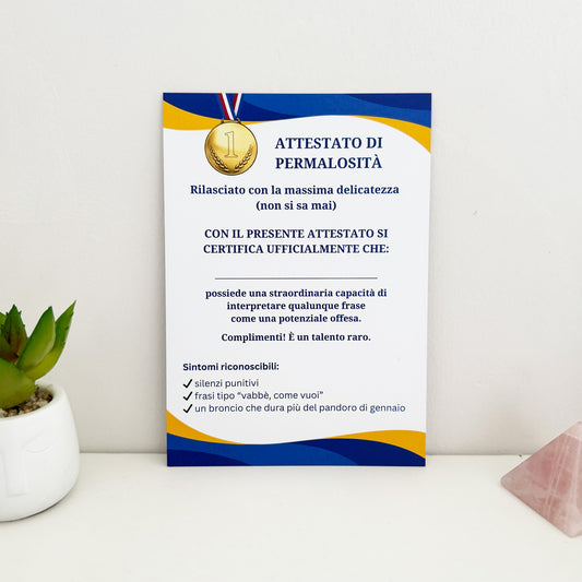 foto fronte del biglietto di auguri "attestato di permalosità avanzato"